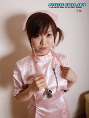 Sexy asian nurse in pink dress