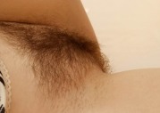 Busty Girl Shows Off Her Hairy Pussy