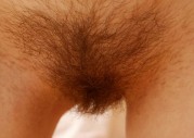 Busty Girl Shows Off Her Hairy Pussy