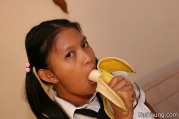 Kat In Uniform Enjoys Posing And Stuffing Her Mouth With Banana