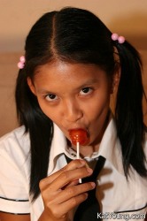 Kat In Uniform Enjoys Posing And Stuffing Her Mouth With Banana