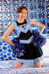 Pretty Asian Girl In Her Blue Cheerleader Uniform