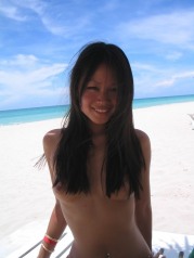 Super Gorgeous Asian Girl Having Fun In The Beach