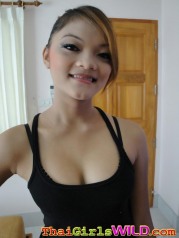 Cute Thai girl with braces takes some self shot photos