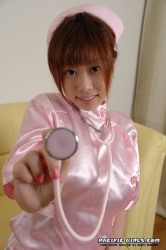 Asiatic nurse stretches pink vagina