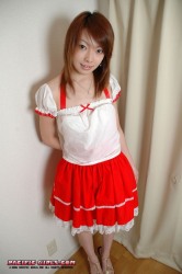 Asian girl in a red dress sucks a dick